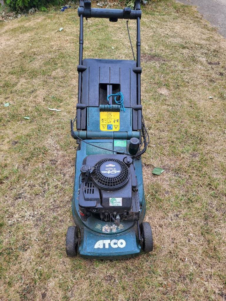 Petrol lawn mower and strimmer 