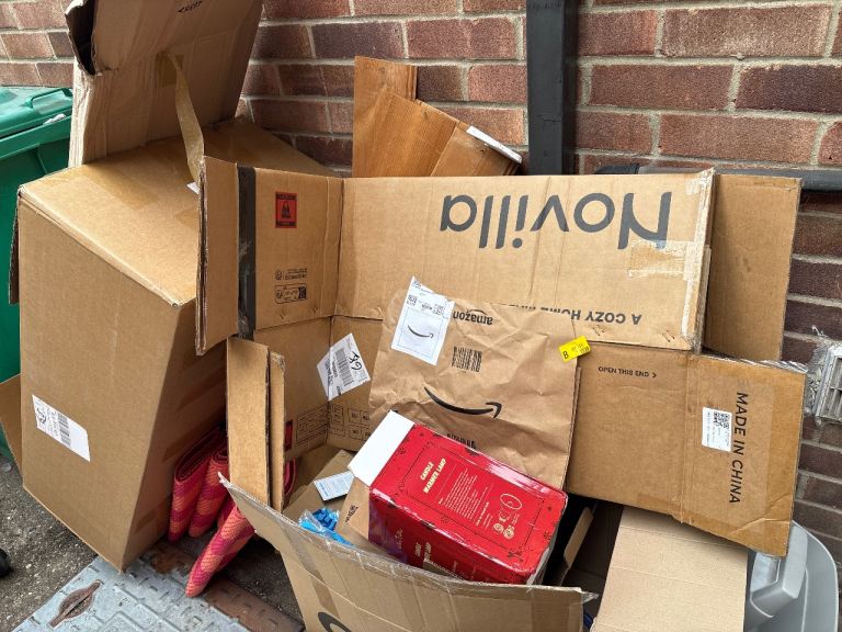 Assorted Cardboard Boxes and Packaging Materials
