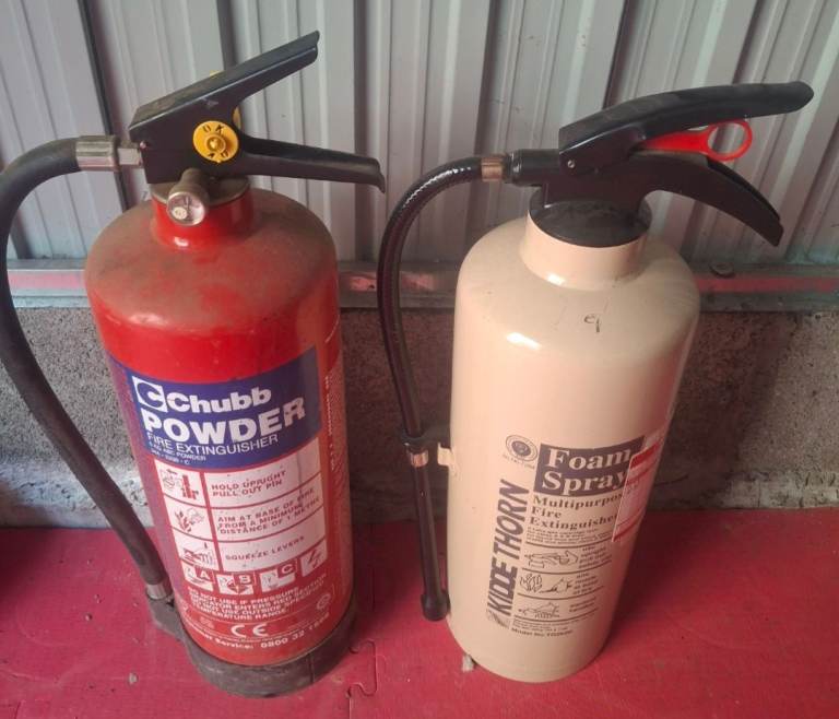 Two full fire extinguisher 