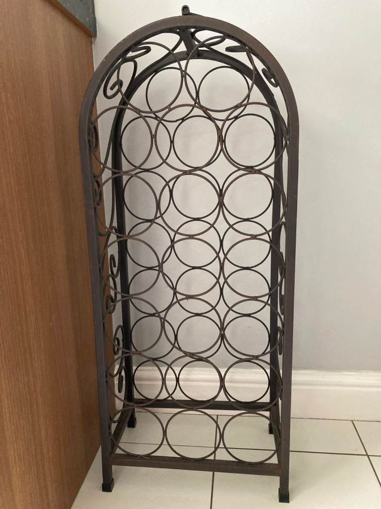 Rustic wrought iron free standing wine bottle rack
