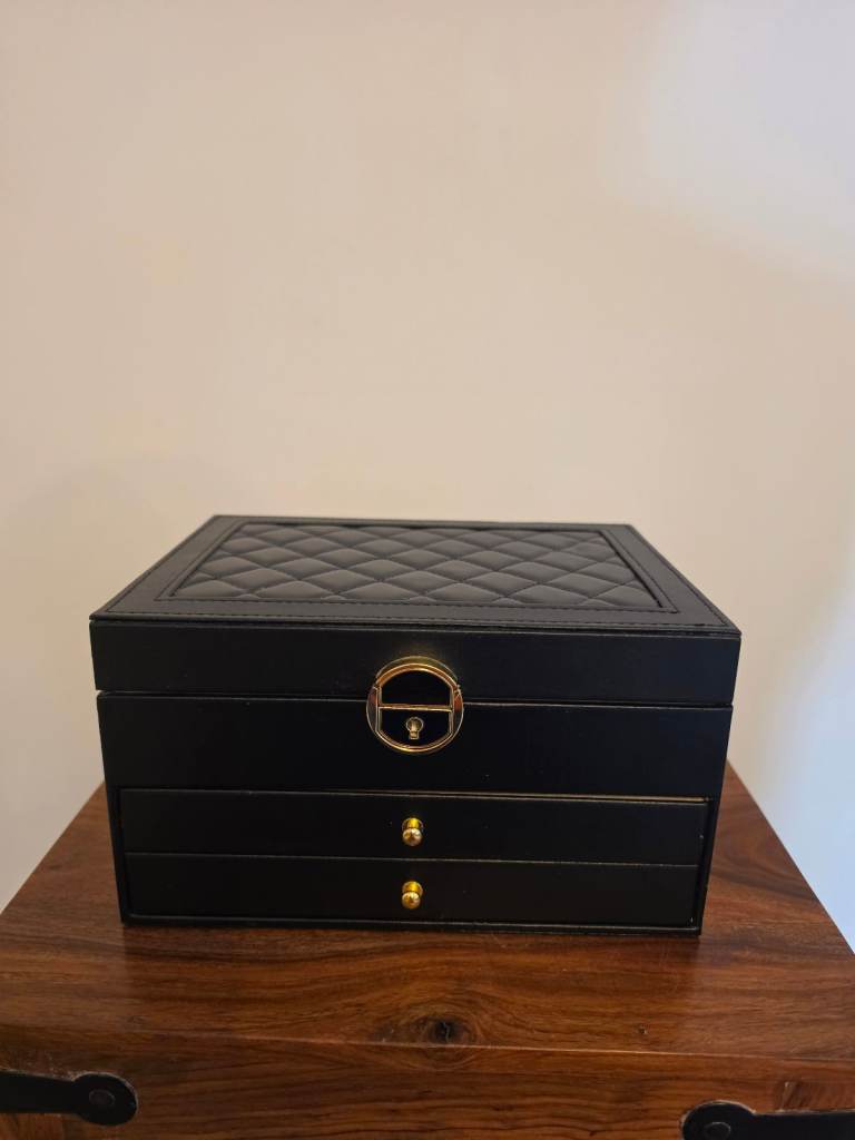 Large black jewelry organizer box with 2 drawers and a key