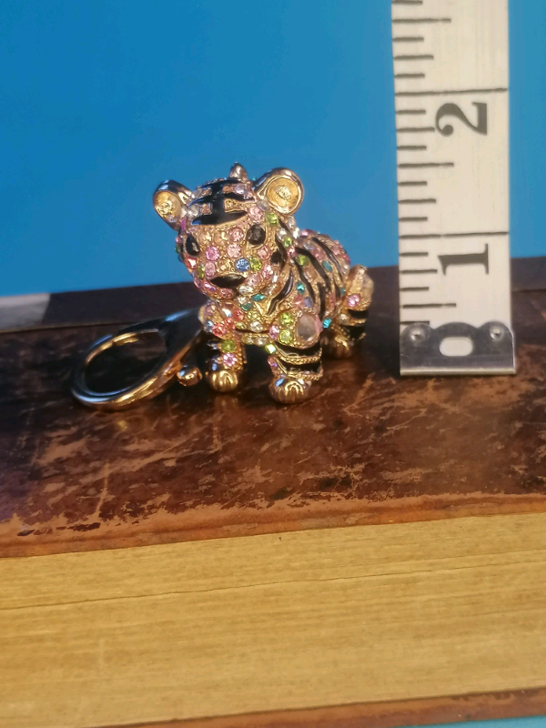 Key holder. Brand new. Legs, hand, and head moving). 