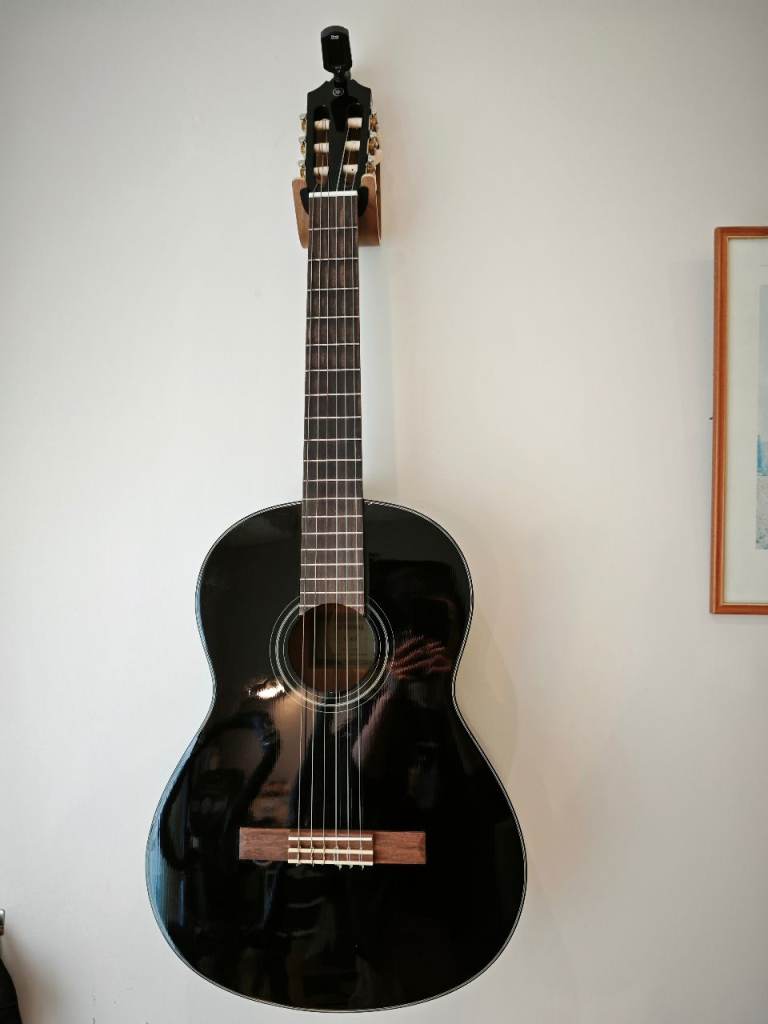 90% New Yamaha Guitar, with free tuner