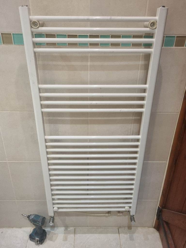image for White straight towel radiator with chrome valves.