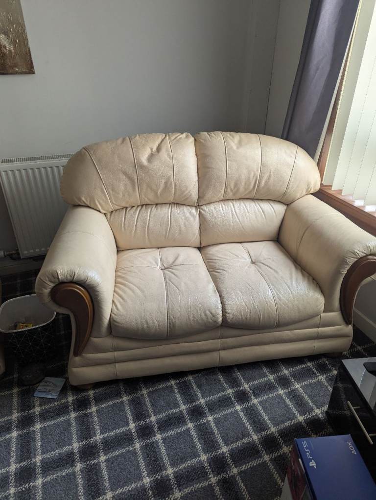 Two seater cream leather sofa