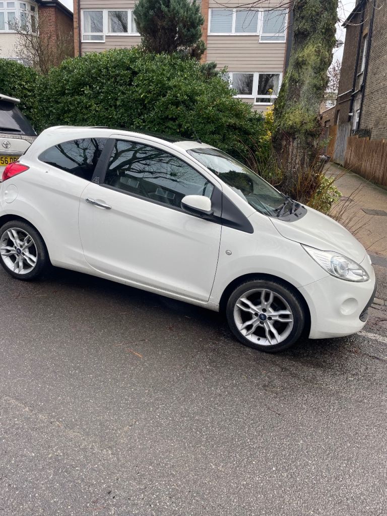 Low milage, well loved, white ford KA