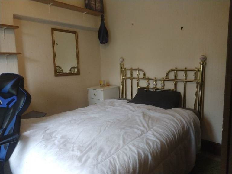 Comfortable but old-fashioned room in calm household