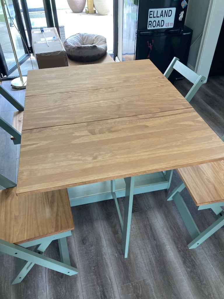 Drop leaf table and four chairs