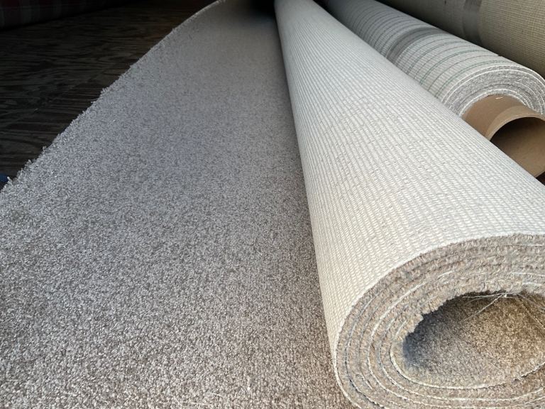 A new 3.60 x 4m beige carpet.