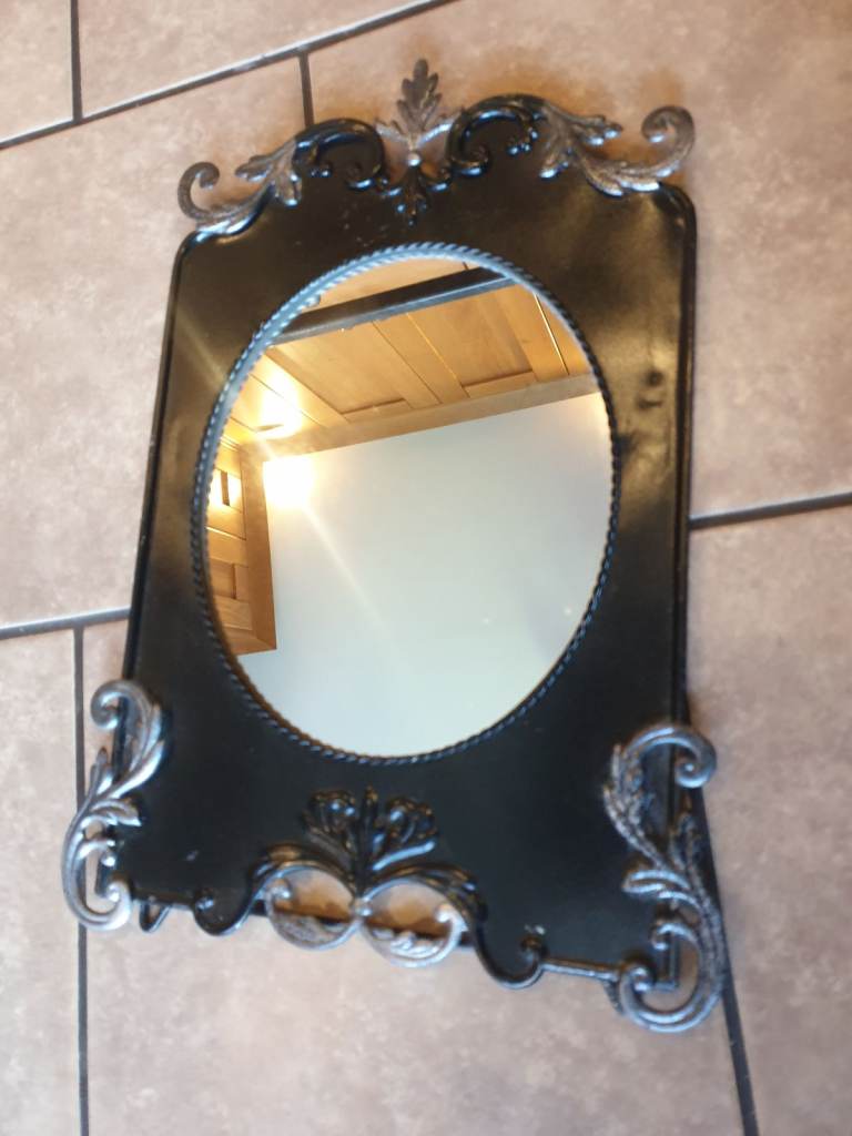 Metal ornate  stand mirror