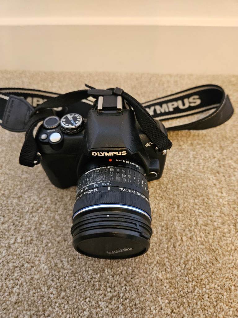 Olympus E-410 DSLR Camera + Olympus Zuiko Digital 14-42mm Lens + Charger + Camera Bag