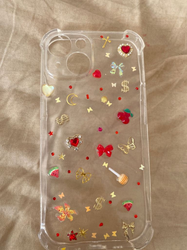 iphone 15 case. homemade. red and gold.