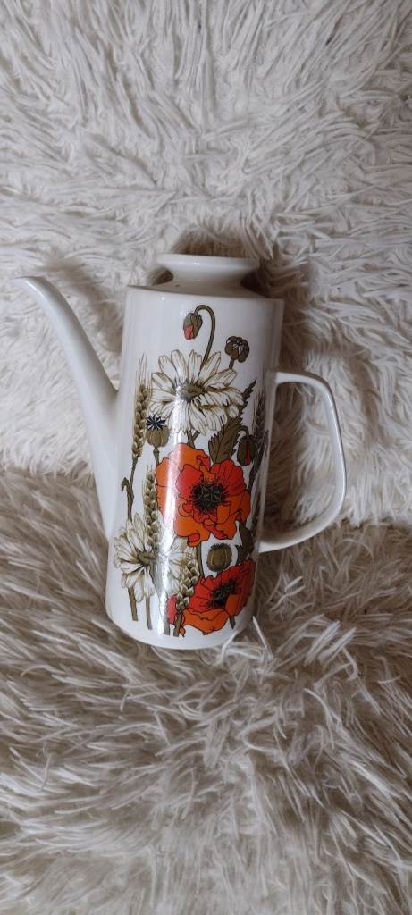 Tall Tea pot with poppy pattern. 