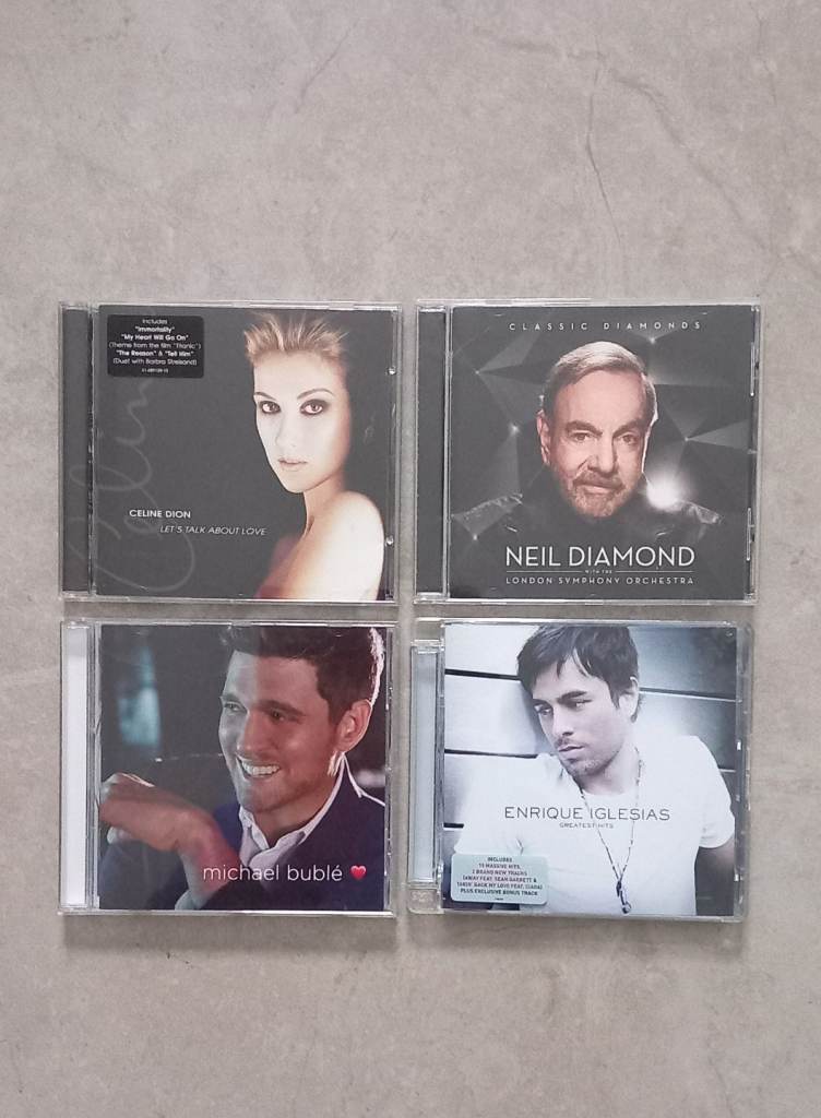 4 Cds. 50p each. Neil Diamond, Celine Dion,....