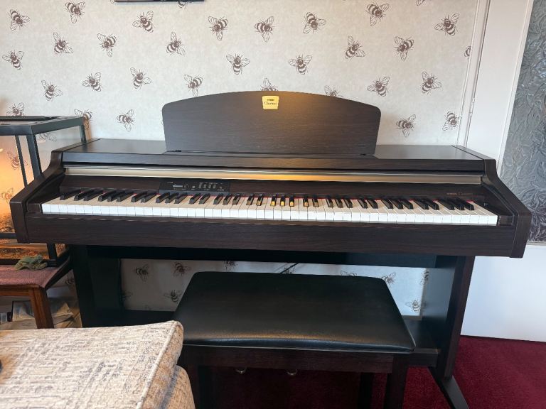 Yamaha Clavinova plus piano stool