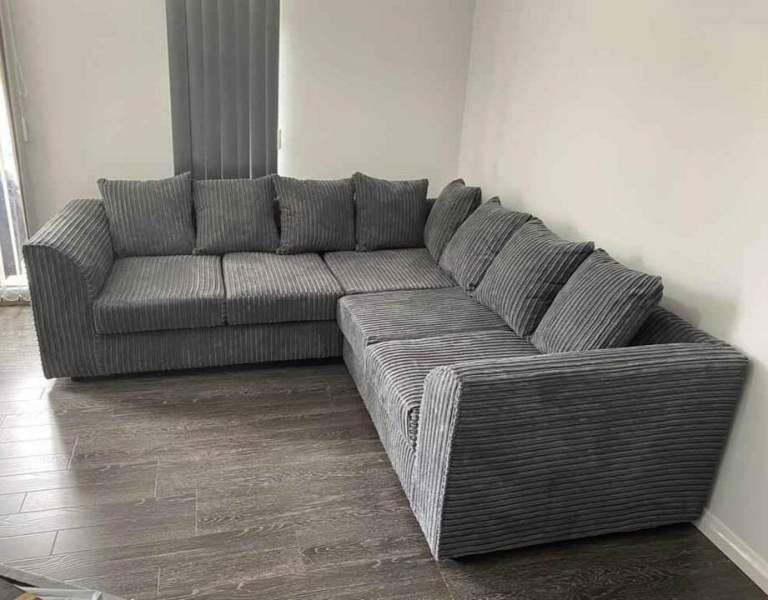 Grey Corner Sofa with Cushions – Good Condition