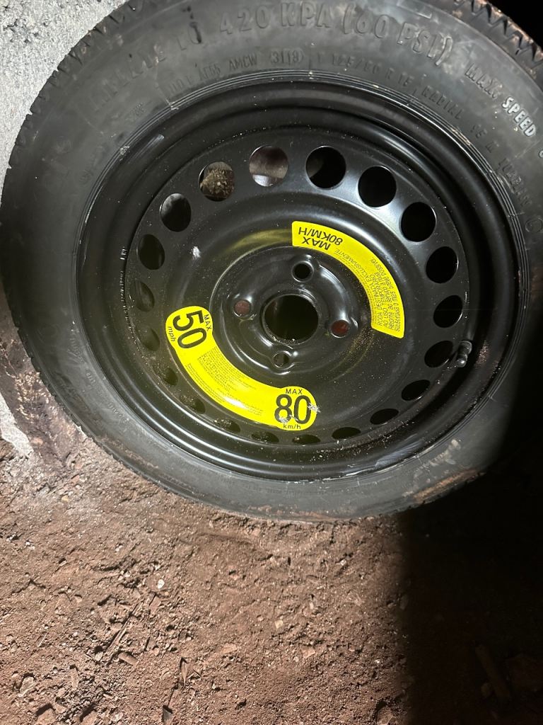 EMERGENCY SPARE WHEEL. Skinny type with full tool kit