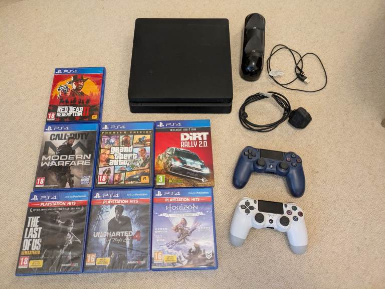 PS4 Slim Bundle, 2 controller, 7 games, charging dock.