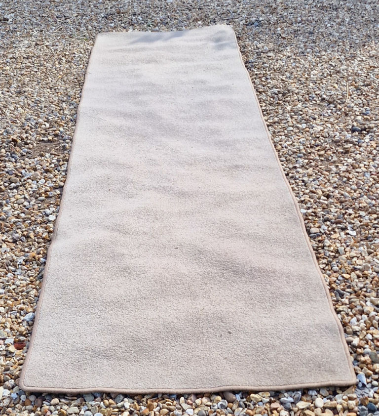 Carpet pieces, runners and mats in cream and truffle 