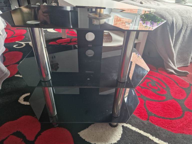 Black Glass TV Stand with Chrome Legs – Good Condition