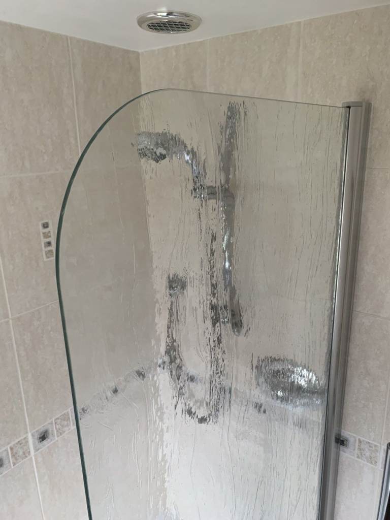 Shower bath screen, hinged. Excellent condition, Novellini Aurora 1, curved top, 75cm, aqua glass.