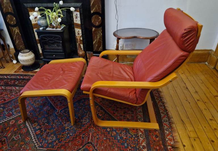 IKEA red leather Poang armchair and matching footstool