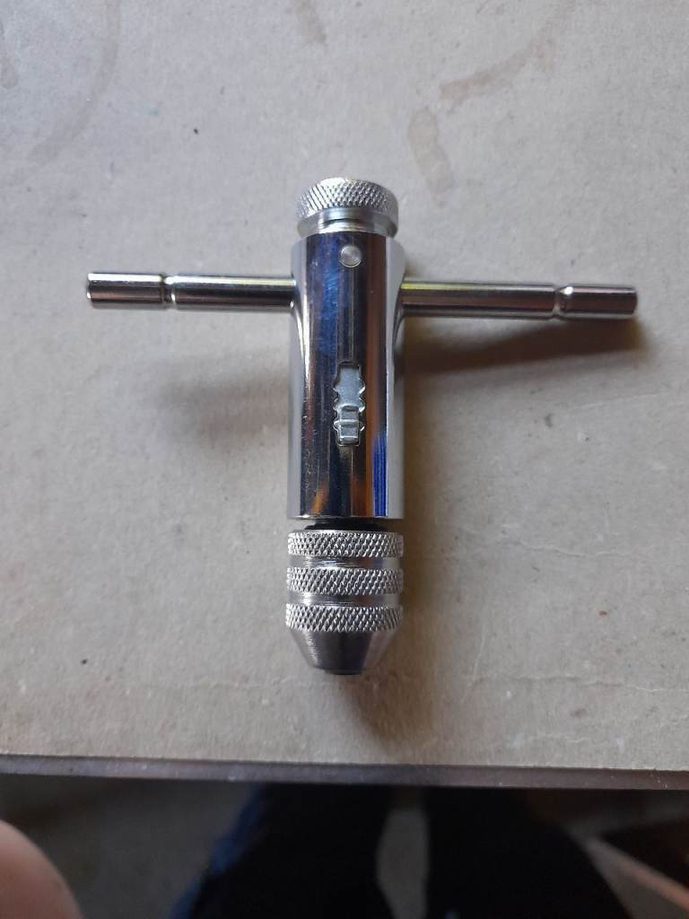 Ratchet tap wrench. 