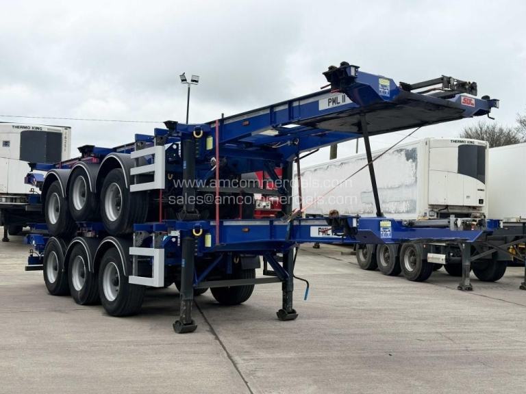 SDC SLIDING SKELETAL TRI AXLE TRAILER