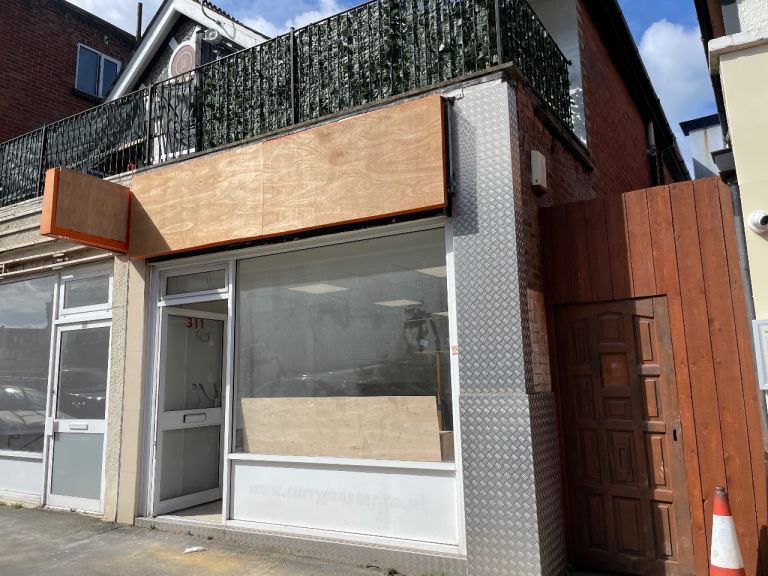 Charminster Road lock up shop approx 400ft2 