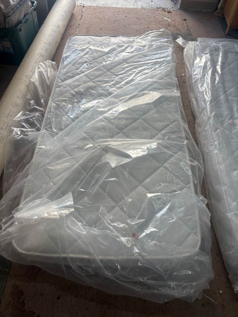 Two single mattresses