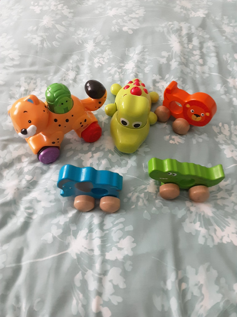 There are 3 animal toys .1 toy that needs batteries and 1 you press to make move