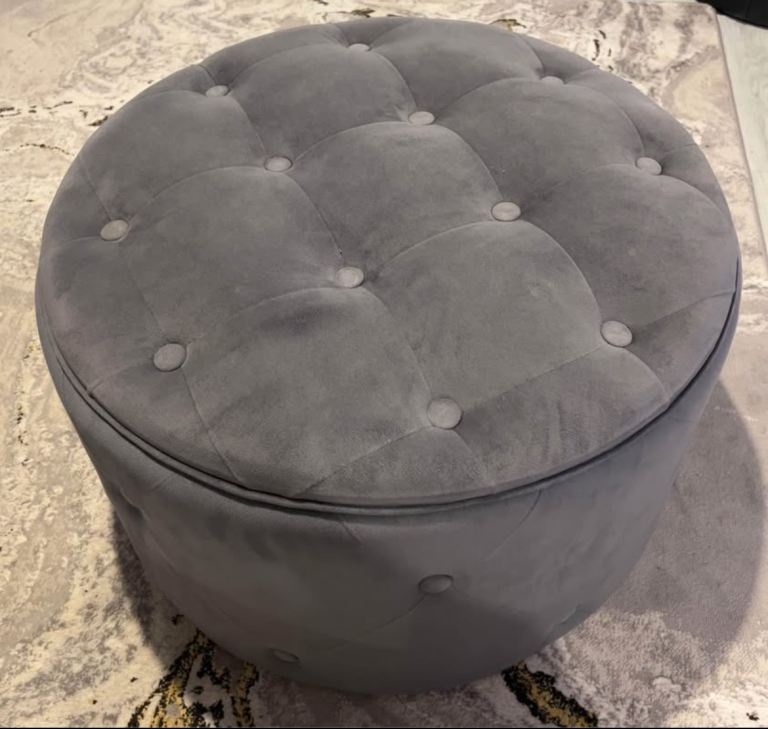 Grey velvet tufted round storage ottoman