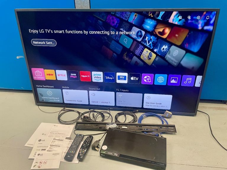 54” LG Brand Flat Smart Wall Mounted TV with all cables and Manuals Including Free DVD Player