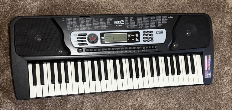 RockJam RJ654 54-Key Portable Electronic Keyboard Piano – Good Condition - with a stand. 