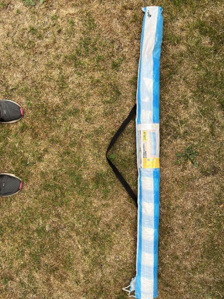 Blue and White Striped Windbreak – Good Condition