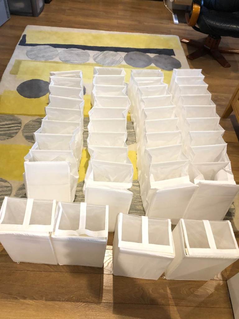 IKEA SKUBB hanging storage unit with shelves and separate boxes.