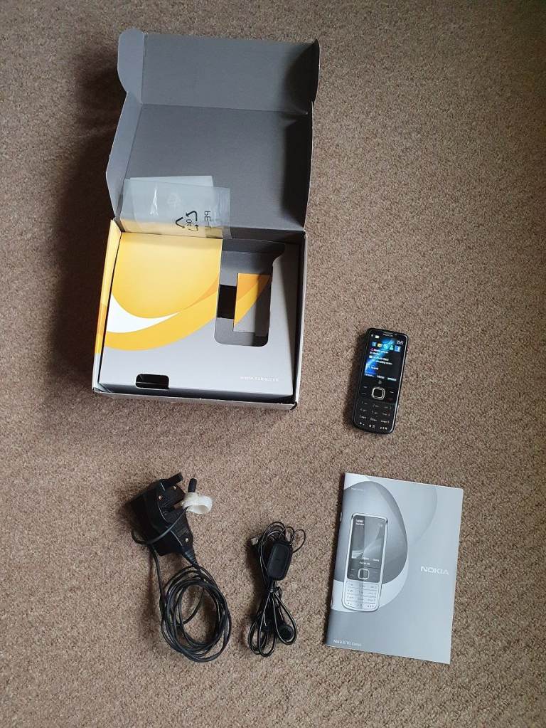 image for Nokia 6700 Classic with box, charger manual and accessories shown - retro vintage
