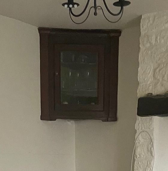 Antique Georgian cupboard with old glazing front with 2 serpentine shelves inside