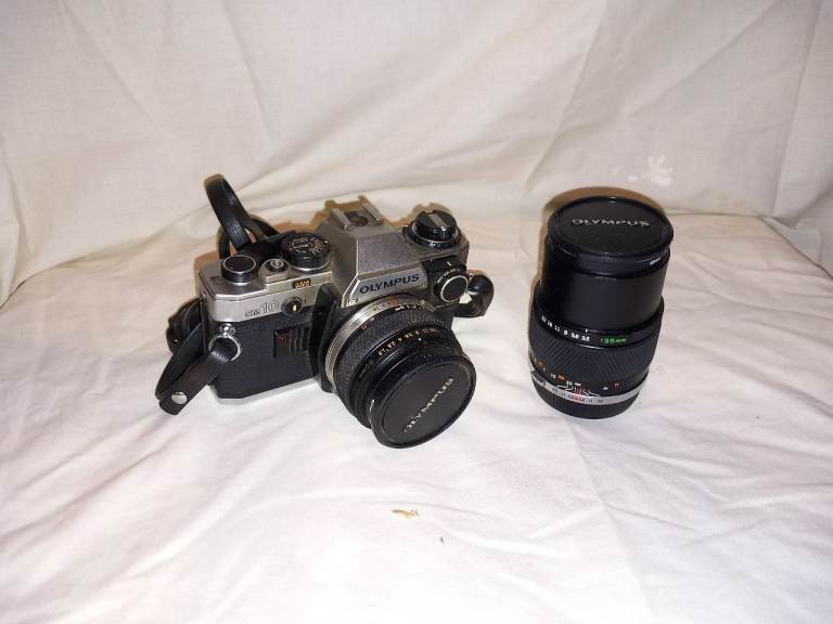 Olympus OM-10 35mm Film Camera with 50mm Lens and additional 135mm lens
