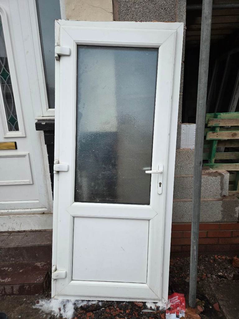 image for UPVC white single solid external door with key frosted glass
