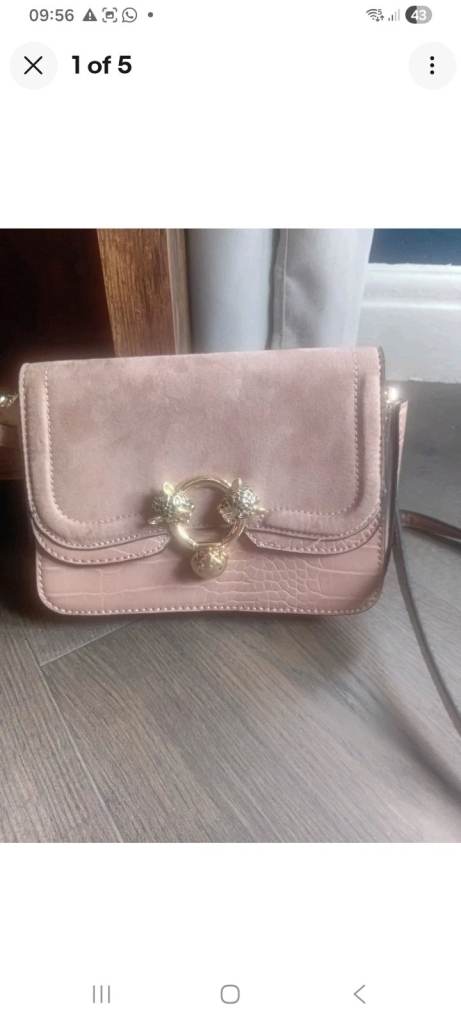 Pink bag from topshop with cheetah detail fastening 