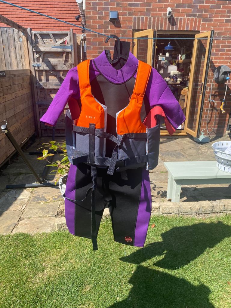 Female wet suit and life jacket
