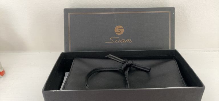 Suam black leather jewellery holder. New, boxed.