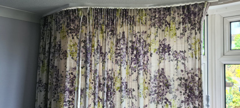 Pair of fully lined Next pencil pleat curtains 1.83m drop. Pretty floral pattern.