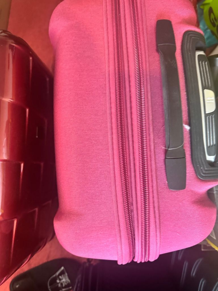 It Medium red suitcase 