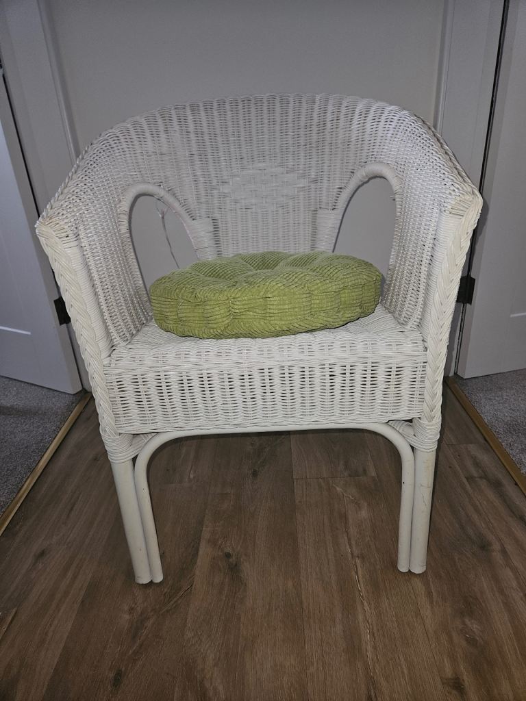 Wicker chair, label still attached.