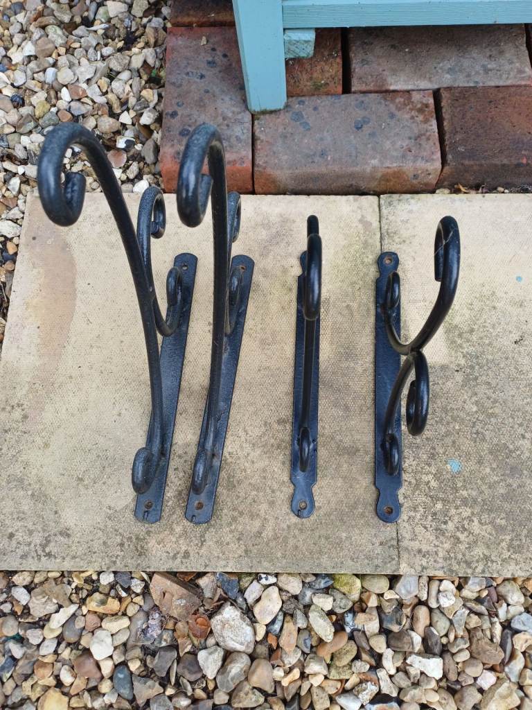 Ornate hanging basket brackets 