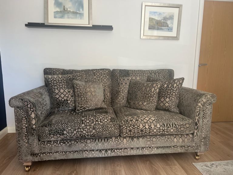 Alstons Fleming 2 seater sofa in a geometric olive/moss green cut velvet