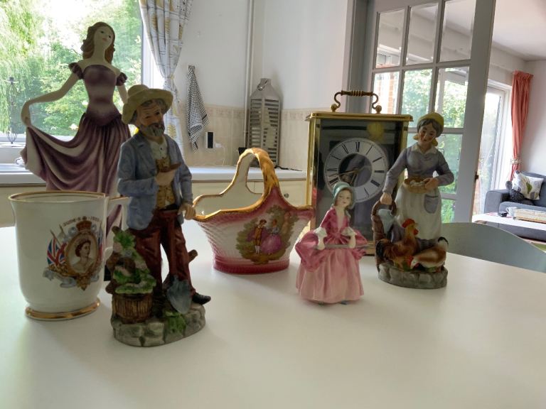 Ceramic figurines and clock