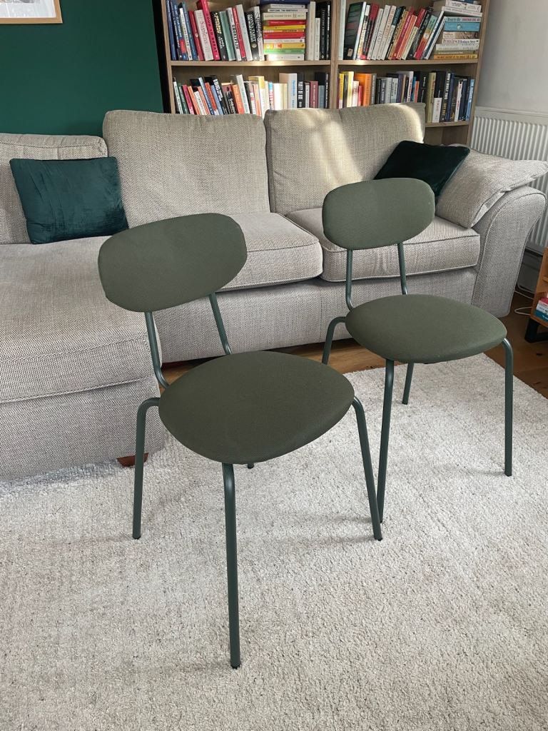 Two green dining chairs 
